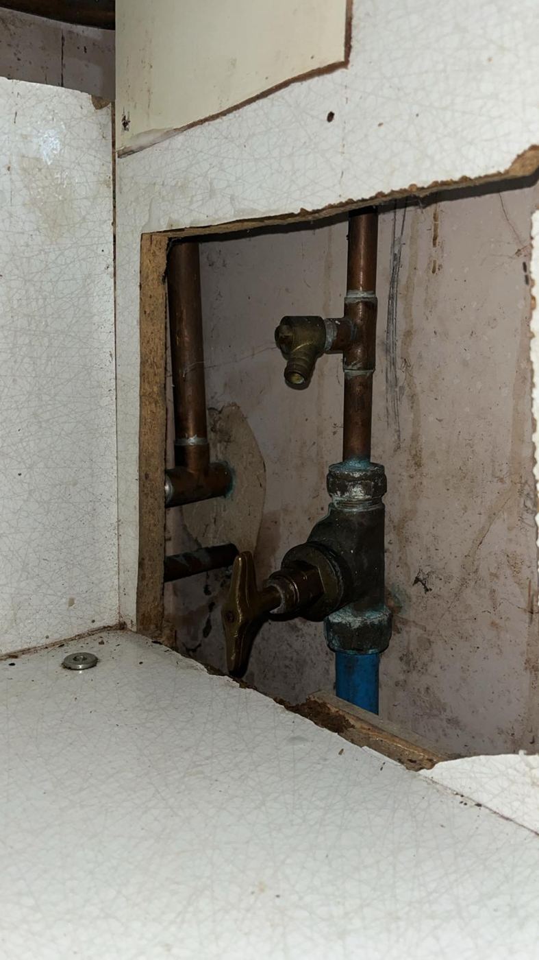 Hidden stop tap access